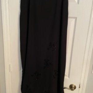After Dark evening wear	black	24w	lined sheer floor length skirt with bead work